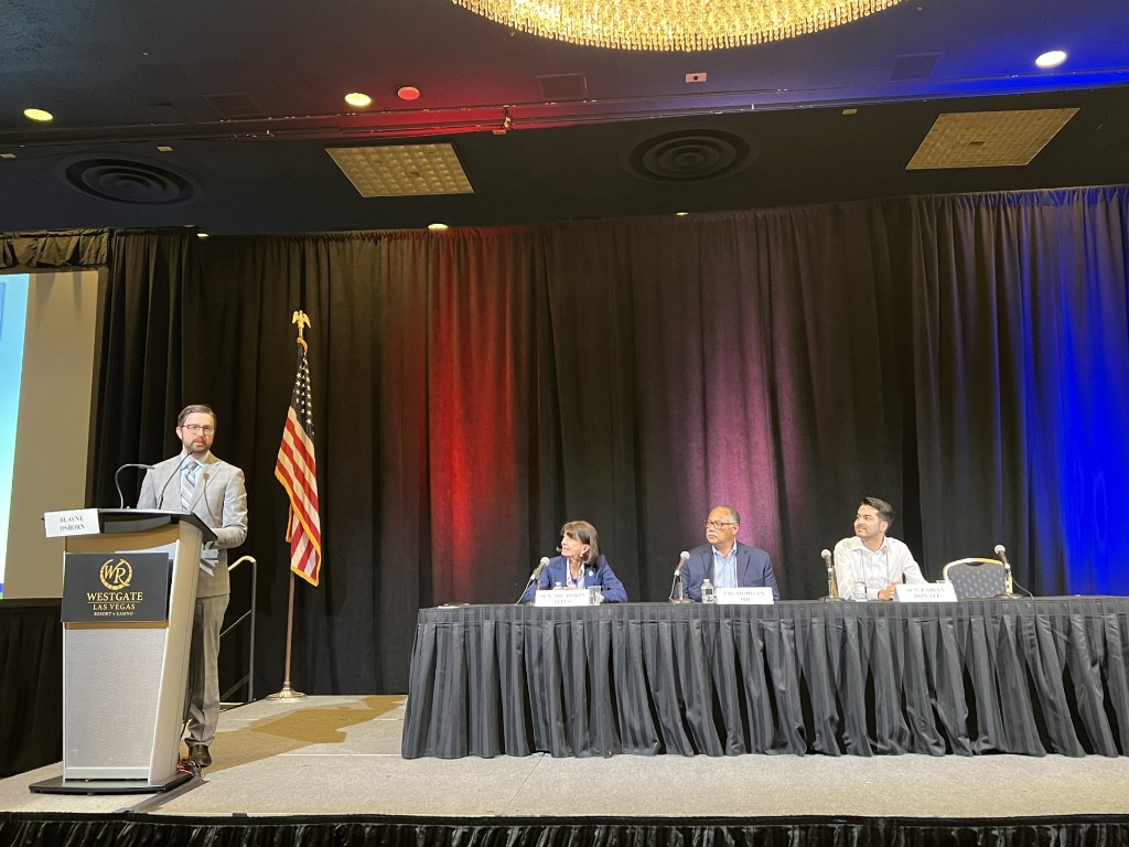 Blayne Osborn speaking at a conference